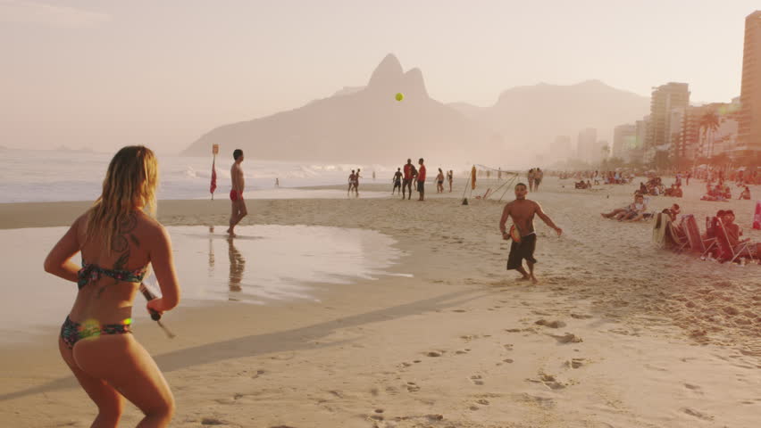 RIO DE JANEIRO, BRAZIL - JUNE: Slow motion, tracking shot of a couple playing
