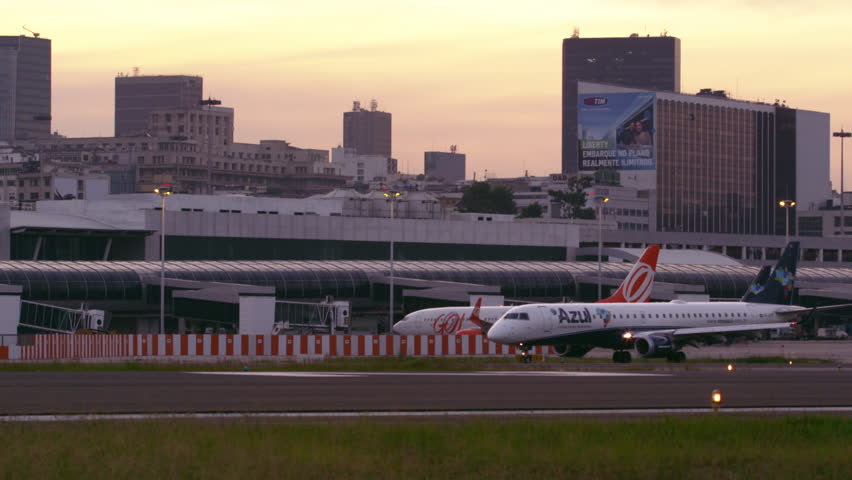 RIO DE JANEIRO, BRAZIL - JUNE 21: Static shot as plane taxis on tarmac as