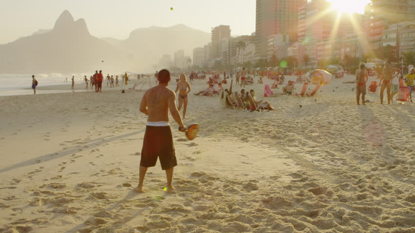 RIO DE JANEIRO, BRAZIL - JUNE: Slow motion shot of a couple playing tennis on