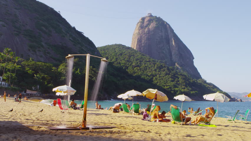 RIO DE JANEIRO, BRAZIL - JUNE: Static shot of people on a Rio beach.