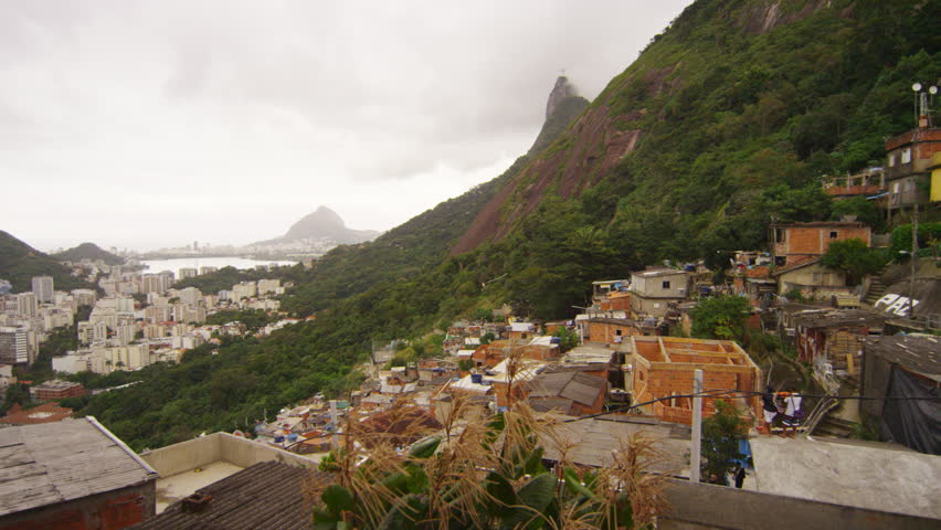 RIO DE JANEIRO, BRAZIL - JUNE 23: Slow panning shot overlooking favela of Rio