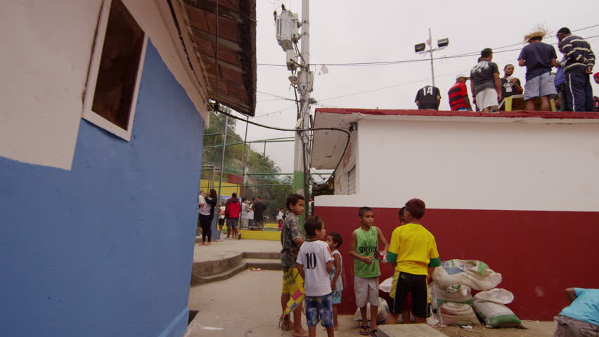 RIO DE JANEIRO, BRAZIL - JUNE 23: Slow dolly shot, favela occupants on June 23,