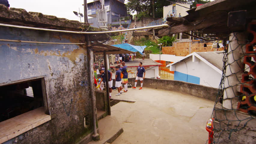 RIO DE JANEIRO, BRAZIL - JUNE 23: Tracking Shot of Soccer Players Preparing to