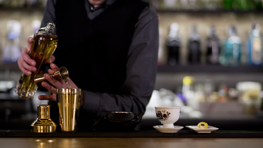 an-experimental-cocktail-waiter-makes-stock-footage-video-100-royalty