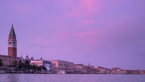 venice cityscape day to night timelapse seen from the sea boats passing by