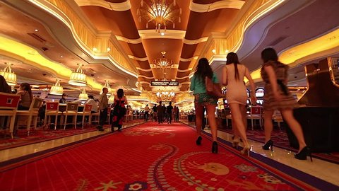 LAS VEGAS,NEVADA - CIRCA April 2012 :people walking inside the wynn casino hotel red carpet