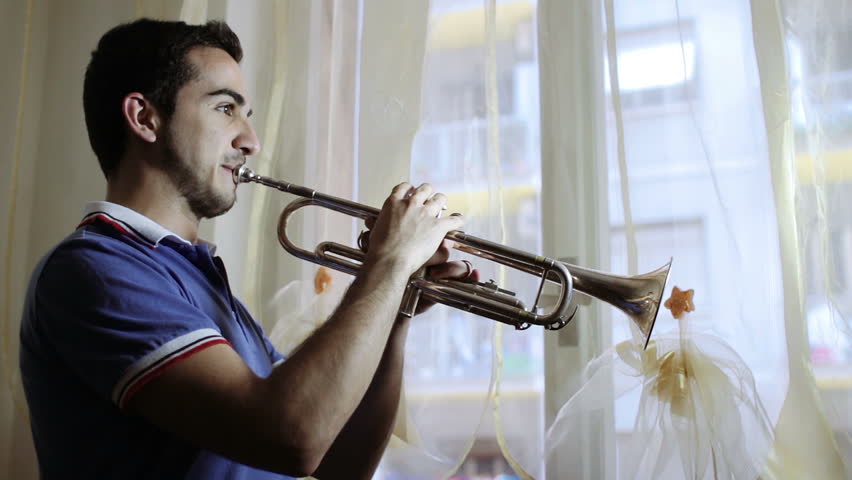 a man playing the trumpet - passion for music