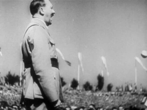 Adolf Hitler addresses crowds in speech in Germany circa World War II