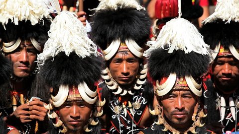 INDIA - DECEMBER 2012: Chang tribesmen wearing traditional costume tribal dancing festival, Nagaland, North East India