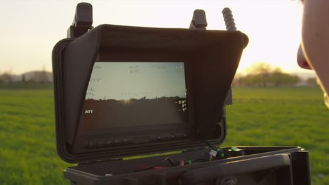 SLOW MOTION: Looking at live video while filming with a drone
