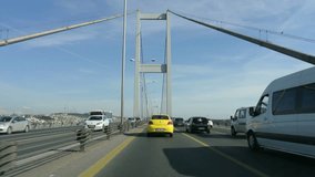 Fast forward video from a car driving across the Bosphorus Bridge in Istanbul Turkey. Going from the European side to the Asian side. Six times fast forwarded.