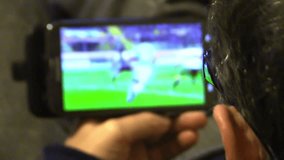 Man watching football match on tablet computer - Powered by Shutterstock - Get 15% off with code: PIKWIZARD15