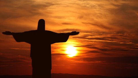 RIO DE JANEIRO, BRAZIL - MARCH 1, 2014 Corcovado Mountain Sunset Rio de Janeiro Brazil Jesus Christ Redeemer Time Lapse Aerial View ( Ultra High Definition, Ultra HD, UHD, 4K, 2160P, 4096x2160 )
