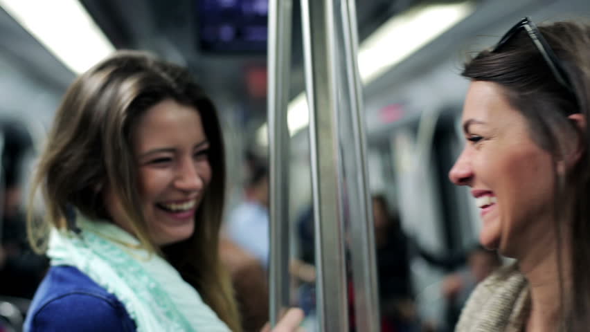 Happy women talking and smiling in subway, steadycam, shot.
 Royalty-Free Stock Footage #6182087