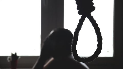 suicide, depressed man, gallows noose around his neck