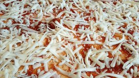 Pizza preparing  ham over cheese in high  definition 1920x1080 FullHD footage - Pizza  full covered with cheese HD high resolution close up footage