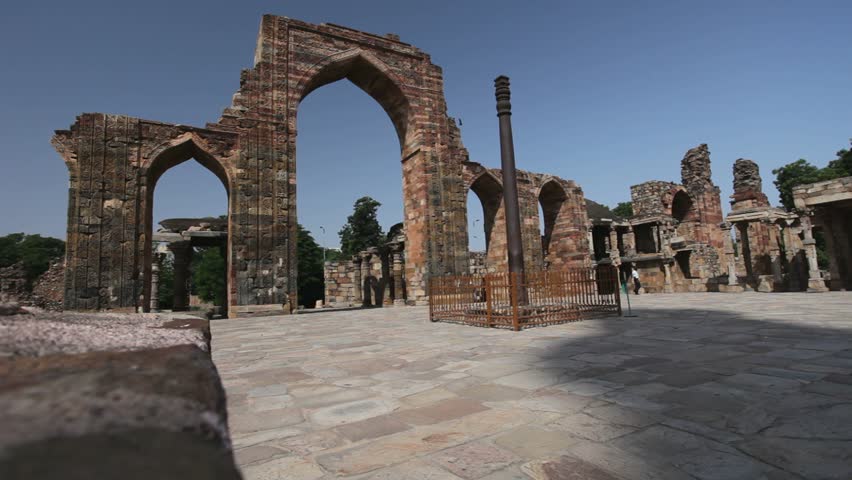 Structures around qutub minar the tallest brick tower in the world in india 