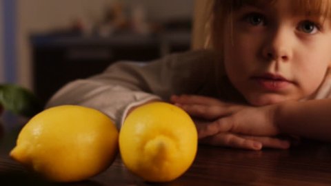 Stock video footage girl and lemon Dolly shot 