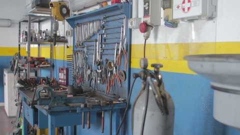 workbench of a auto mechanic - mechanic's workshop - garage - car repair shop -