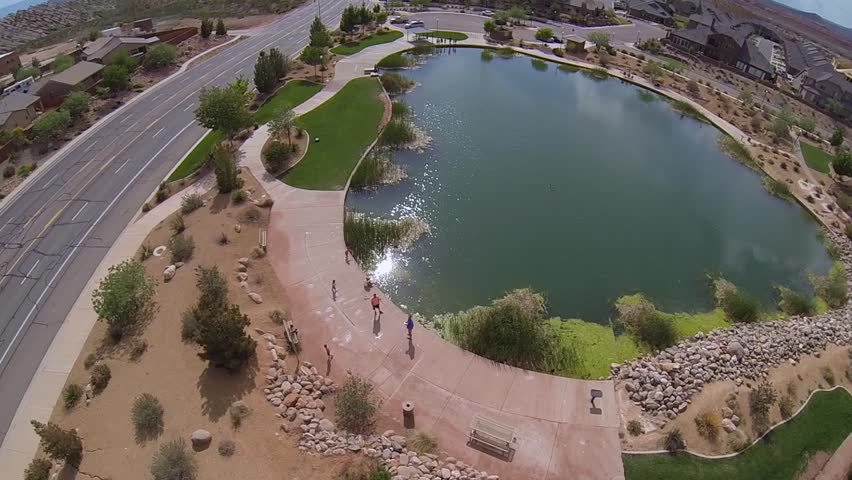 Aerial view of a fishing pond in a Southern Utah suburban community.