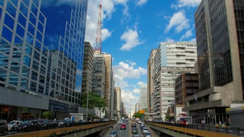 Avenida Paulista day traffic time lapse Sao Paulo Brazil. The street with the most expensive real estate in South America.
