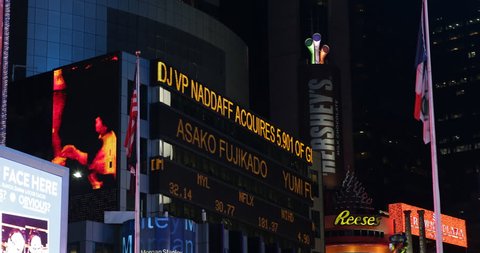 NEW YORK CITY, USA - APRIL 20, 2013 Times Square Illuminated Night Broadway Theaters LED Nasdaq Stock Exchange Board ( Ultra High Definition, Ultra HD, UHD, 4K, 2160P, 4096x2160 )