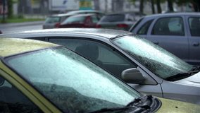 SLOW MOV: Rain Falling On Car Windshield