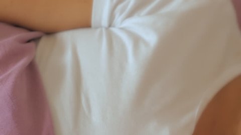 Brunette pretty woman asleep in bed