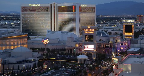 LAS VEGAS, USA - MARCH 29, 2013 Aerial View dusk Las Vegas Strip Boulevard Caesars Palace Casino Hotel night lit ( Ultra High Definition, Ultra HD, UHD, 4K, 2160P, 4096x2160 )