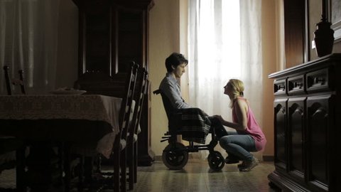 nurse comforting a disabled veteran