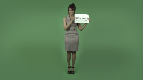 indian business woman isolated on green with hire me sign