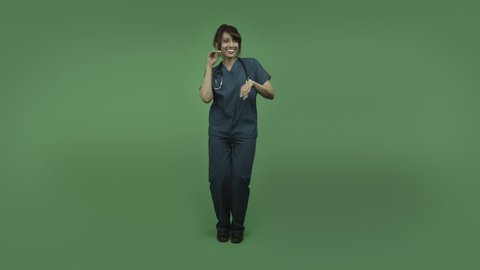 indian female doctor isolated on greenscreen happy dance