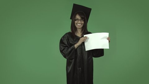 adult student graduate isolated on green happy with blank sign