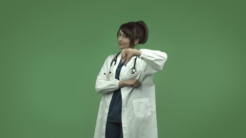 indian female doctor isolated on greenscreen with thumbs down