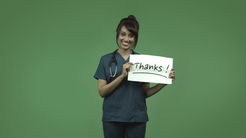 indian female doctor isolated on greenscreen with thanks sign