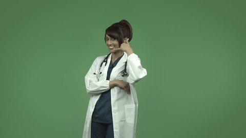 indian female doctor isolated on greenscreen with call me sign