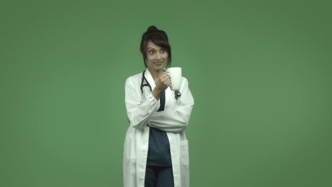 indian female doctor relaxing during coffee break isolated on greenscreen