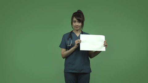 indian female doctor isolated on greenscreen upset with blank sign