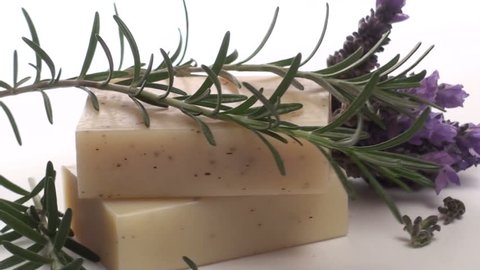 Herbal soap with rosemary and lavender isolated on white zoom-out