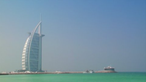 DUBAI - SEPTEMBER 9: A tilt shot shows the famous Burj al Arab Hotel, the Jumeirah Beach  on September 9.2009, Dubai, UAE. 