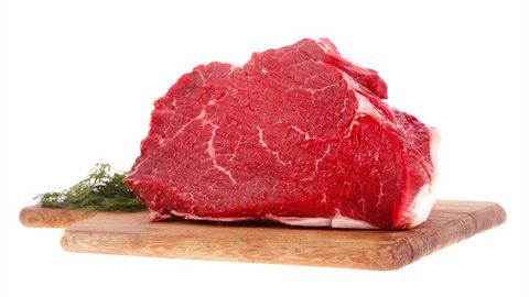 fresh raw red beef meat big steak chunk on wooden cut board 1920x1080 intro motion slow hidef hd