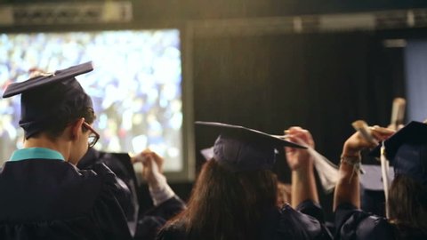 students graduating from university campus - celebration. 