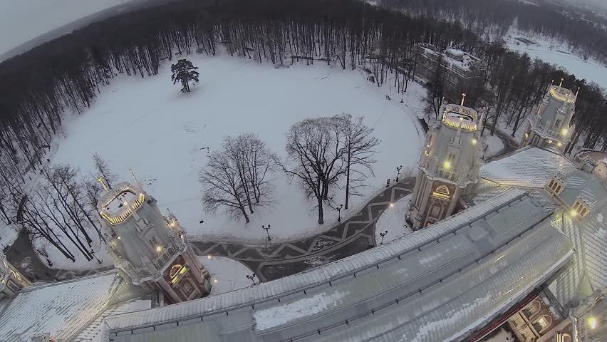 Catherine palace with illumination in Tsaritsyno at winter evening in Moscow. Aerial view