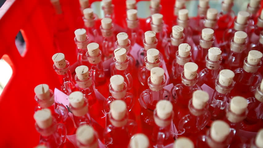 Decorated bottles in red box