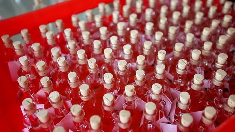 Decorated bottles in red box