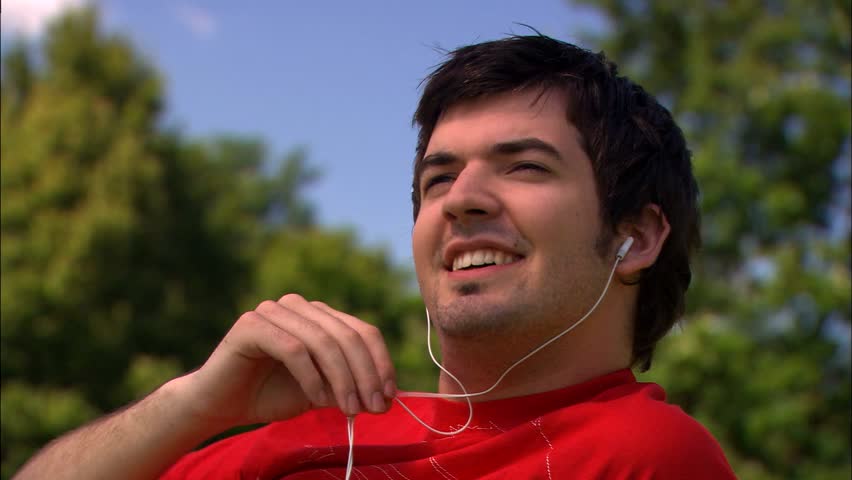 young man listening to music
