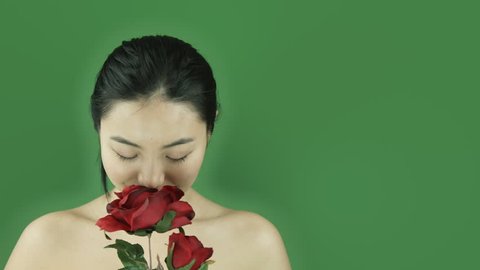 Asian girl naked beauty young adult isolated greenscreen green background romance rose happy