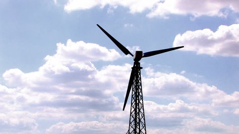 HD A wind turbine, blue sky and clouds background, Canon XH A1, FullHD video, 1080p, 25fps, progressive scan 