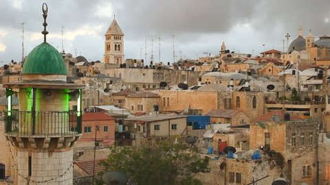 JERUSALEM, ISRAEL CIRCA 2013 - Mosques, churches and synagogues line the skyline across a neighborhood in the Old City of Jerusalem, israel.