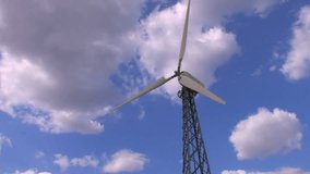 HD A wind turbine, blue sky and clouds background, Canon XH A1, FullHD video, 1080p, 25fps, progressive scan 
